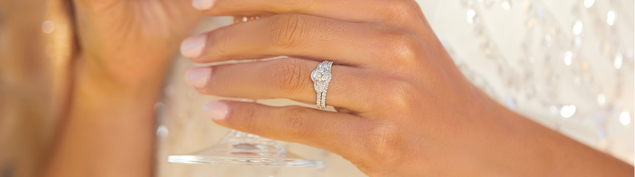 three stone halo diamond engagement ring with diamond wedding band