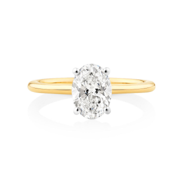 oval cut diamond solitaire engagement ring in yellow gold