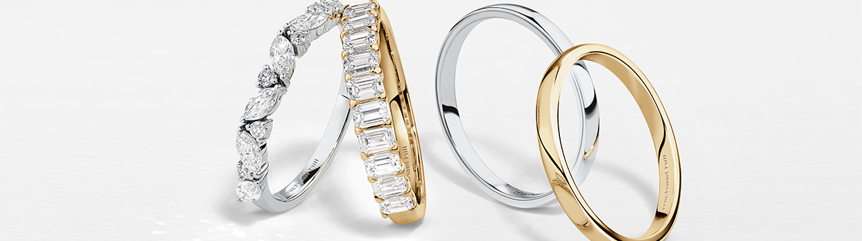 wedding bands flatlays yellow gold and white gold with diamonds