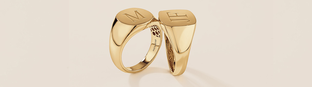 Yellow gold singet rings engraved with initials