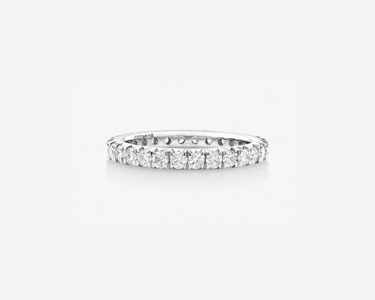 Stangle of white gold eternity band