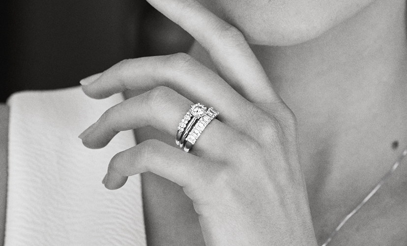  Black & White image of a bride wearing engagement and wedding bands