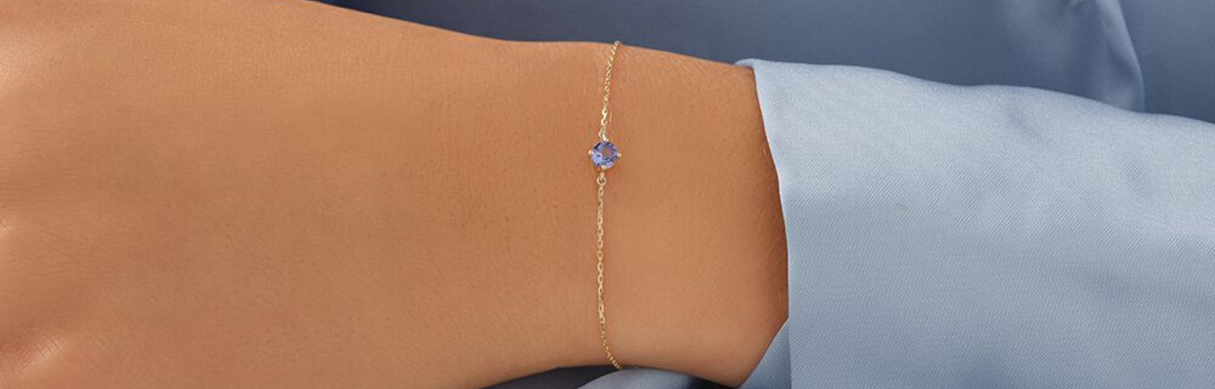 blue stone bracelet on womans wrist