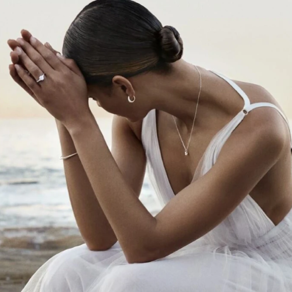 bride wearing michael hill engagement ring and jewellery