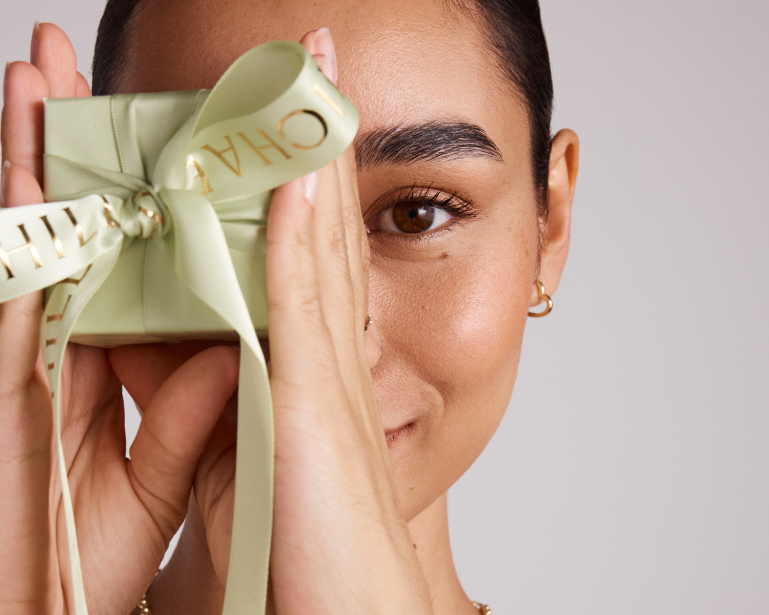 Woman holding michael hill present box