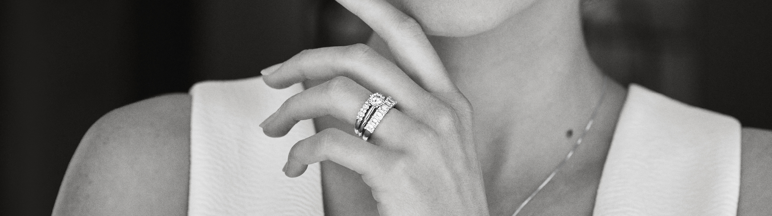  Black & White image of a bride wearing engagement and wedding bands