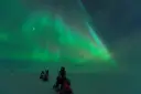 Northern lights, winter and snowmobil
