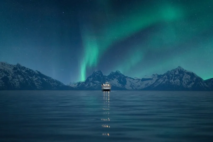 MS Spitsbergen under the Northern Lights in Norway