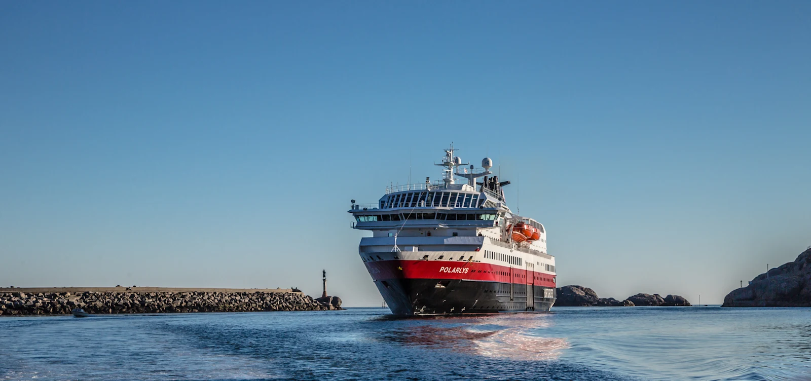 MS Polarlys arriving in the working port of Svolvær in the Lofoten Islands