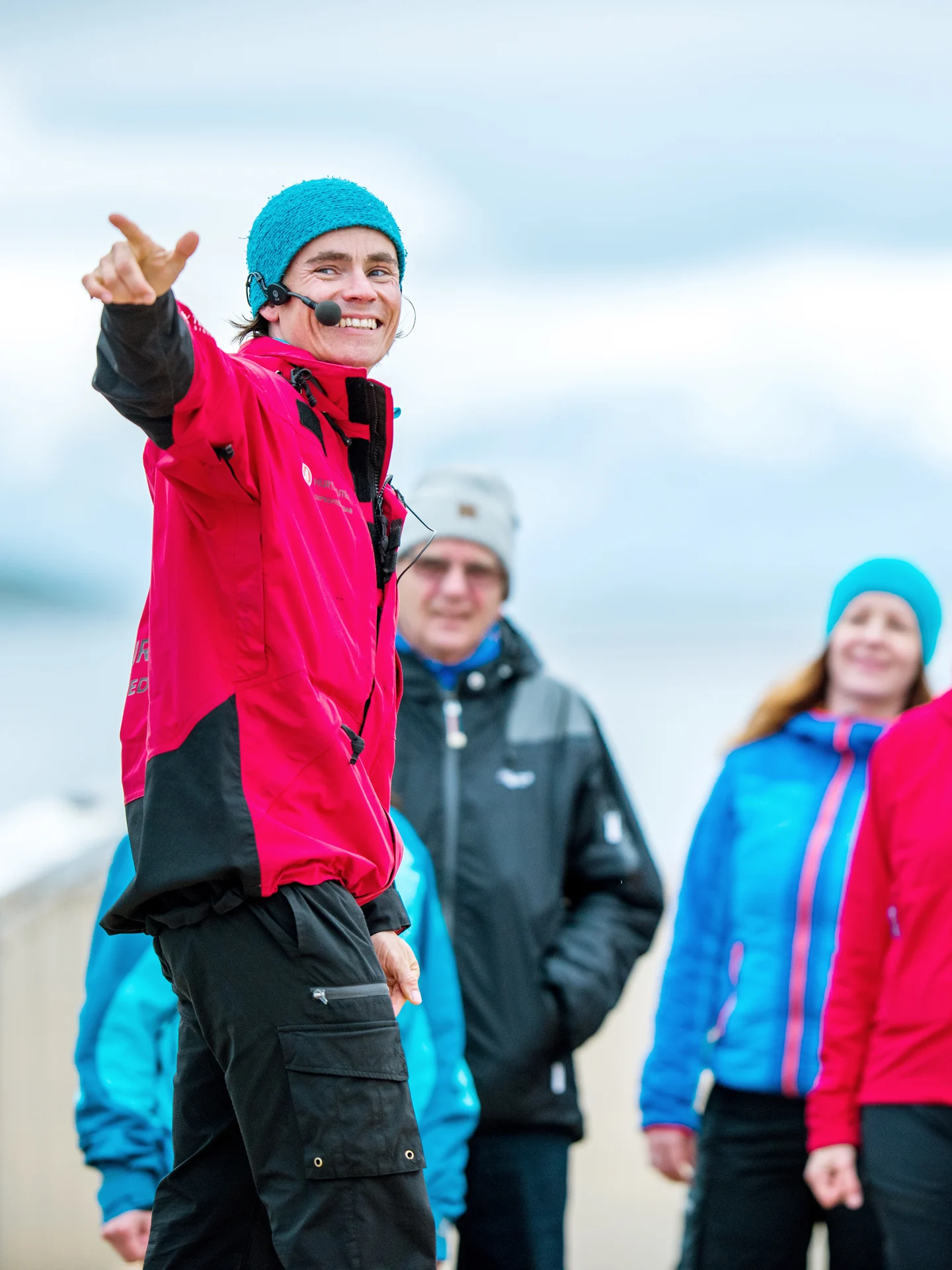 A member of the Hurtigruten Expedition Team sharing insights with guests