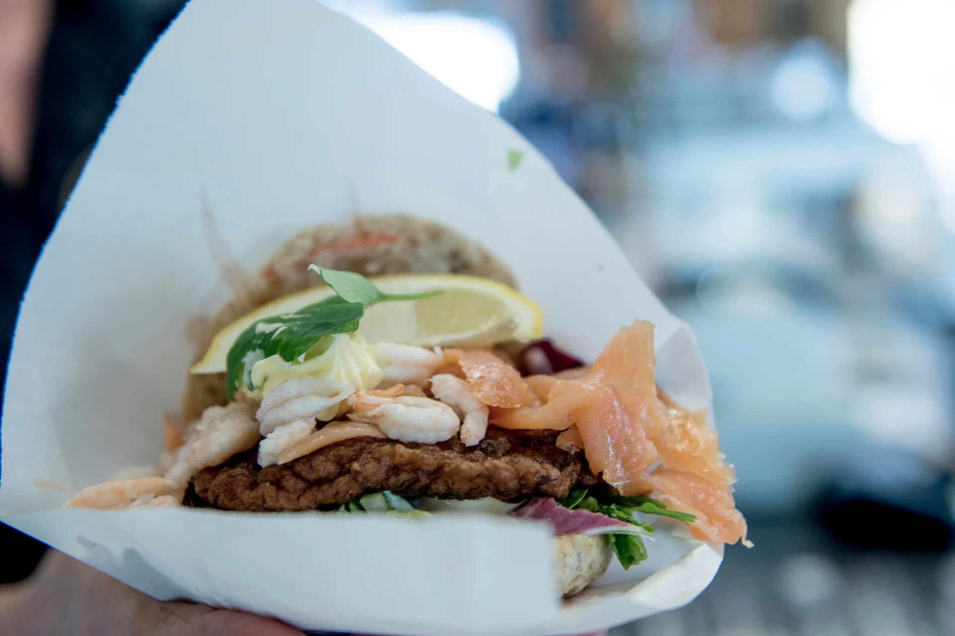 One of the famous fish burgers served at Anita's Seafood in Reine, Lofoten Islands, Norway. Image credit: Thomas Rasmus Skaug-VisitNorway