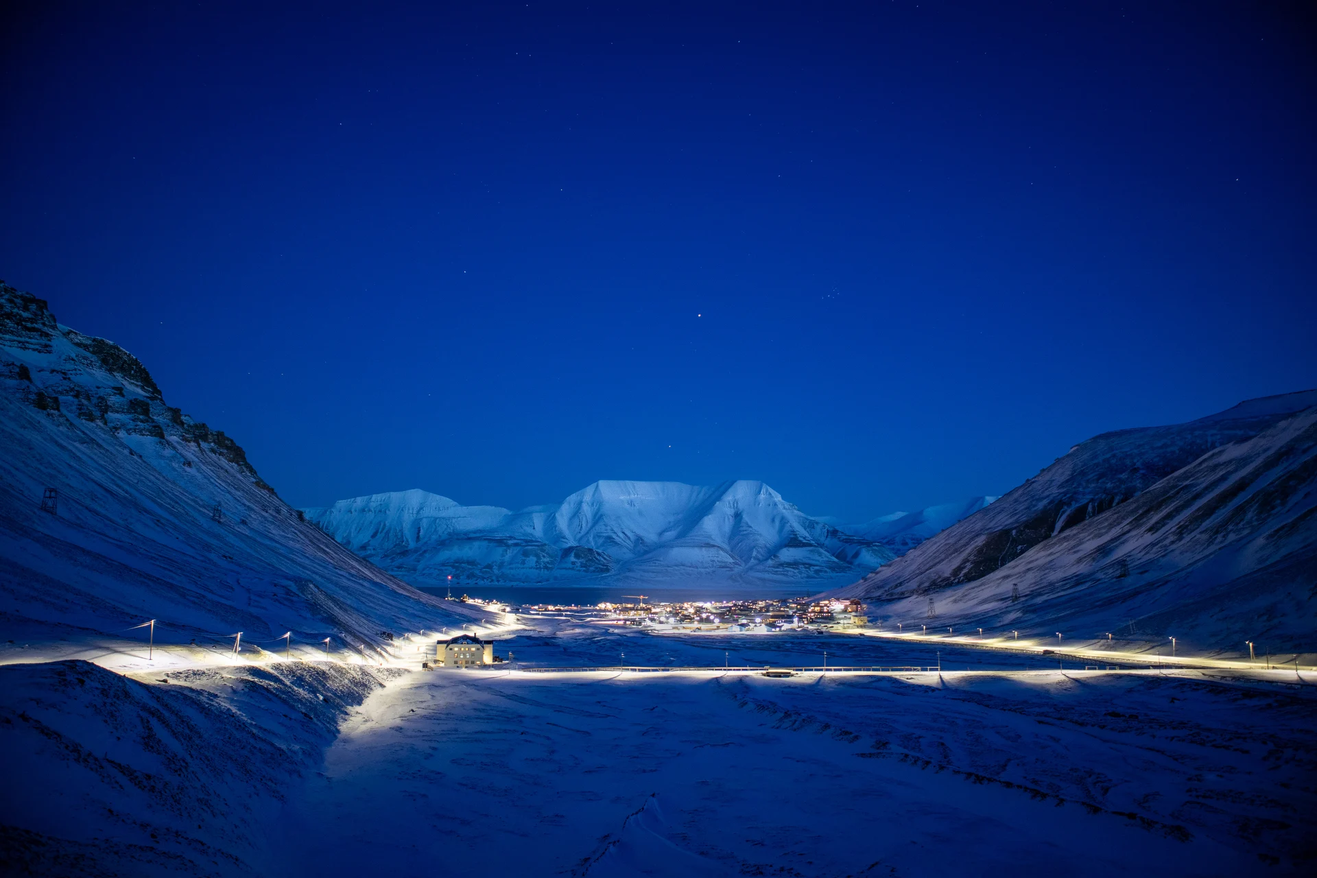 Polar Night casts an otherworldly glow over Longyearbyen, Svalbard