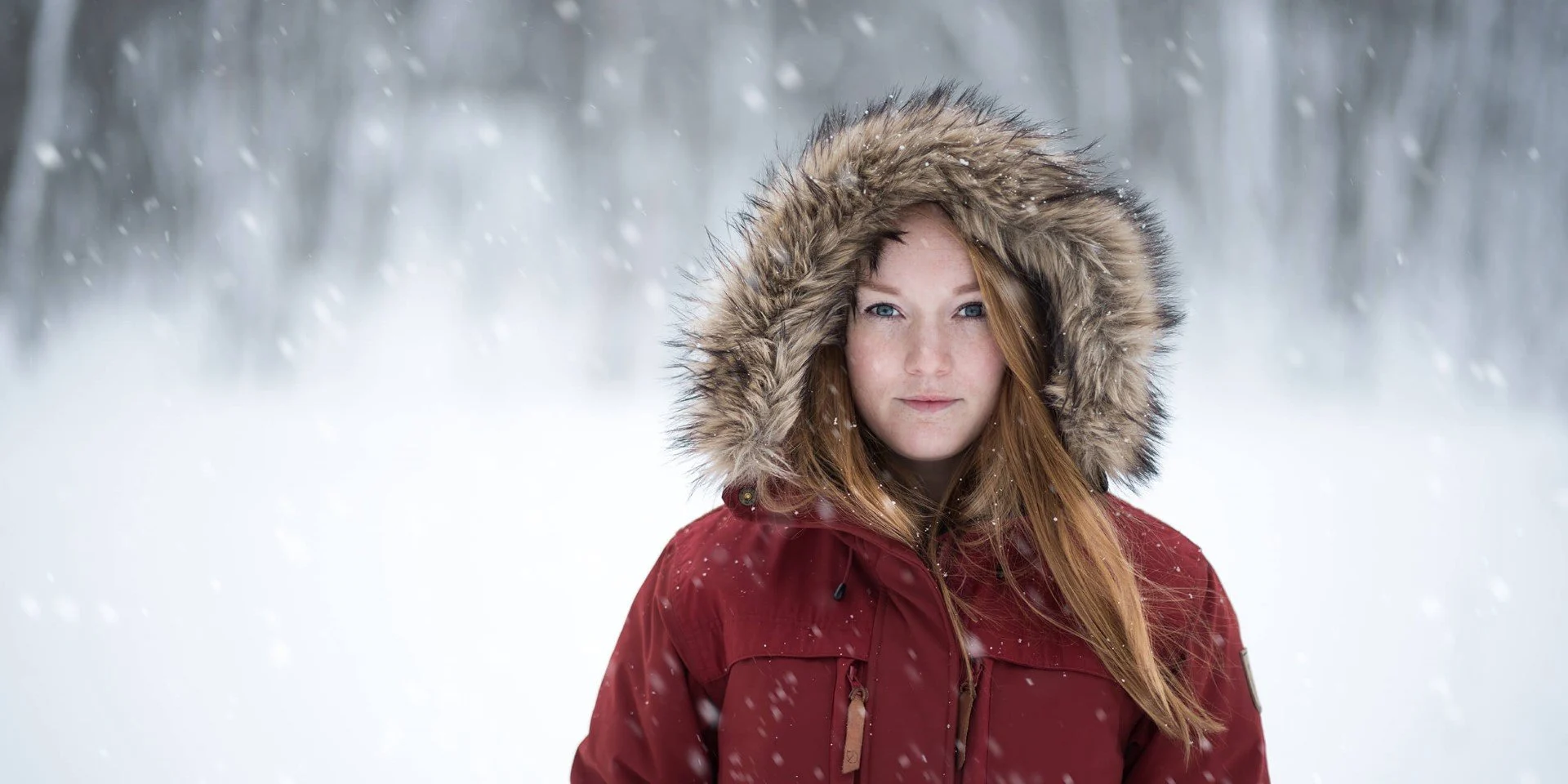 A person wearing a red jacket