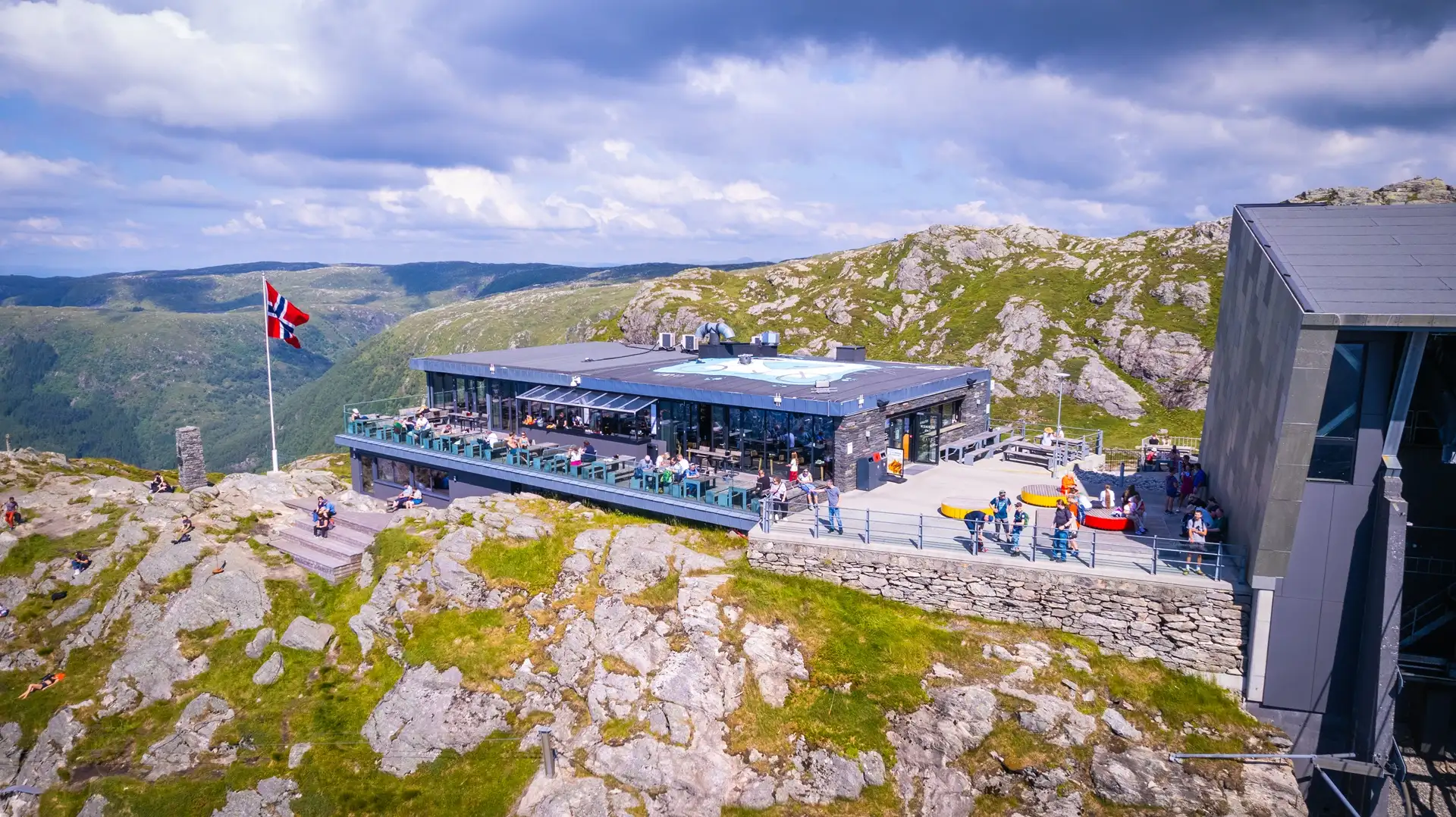 people-socializng-mt-ulriken-terrace-bergen