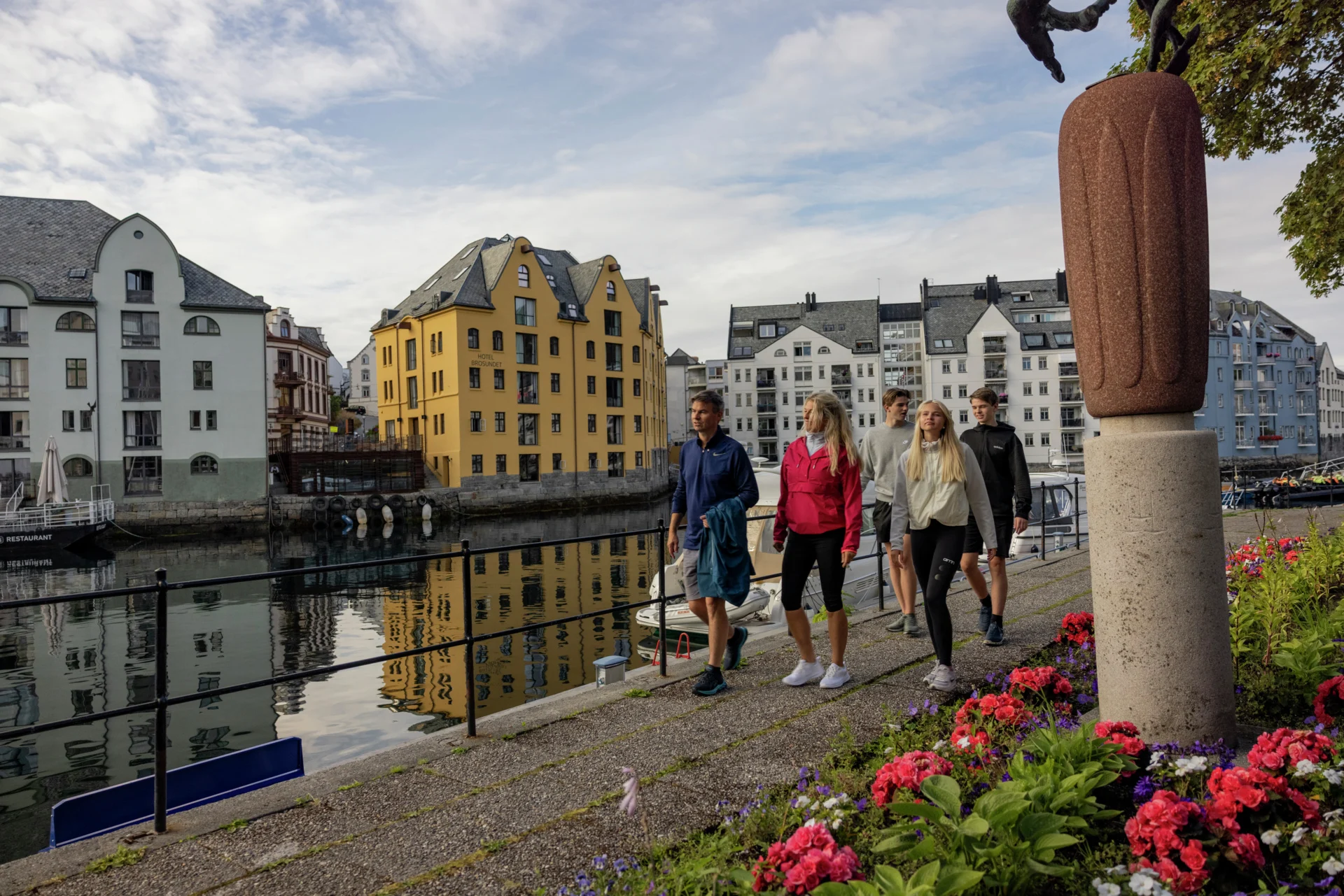 A group of tourists on a walking tour of Ålesund