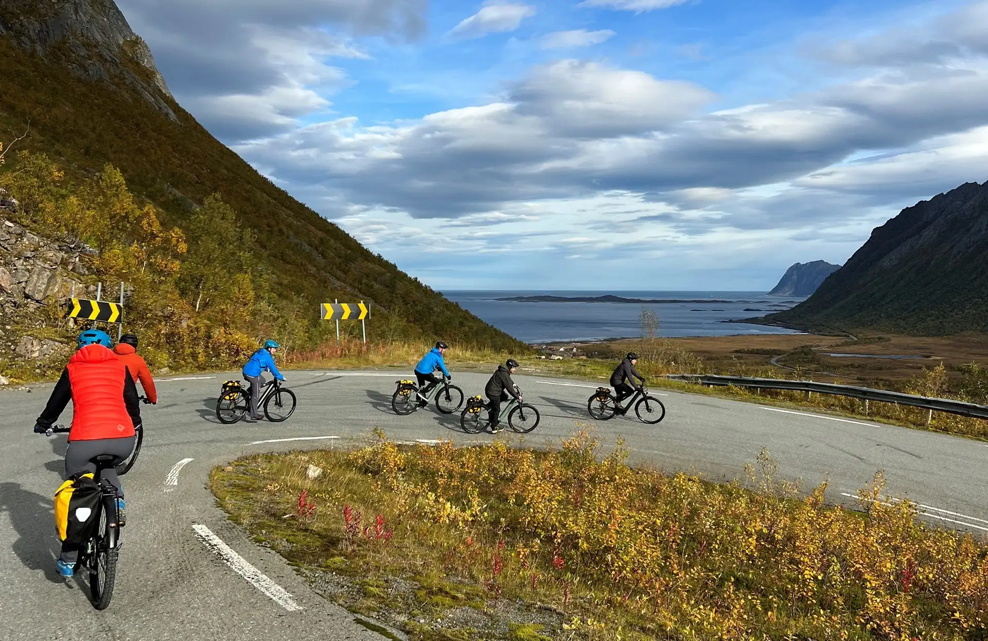people-riding-electirc-bicycles-senja-norway