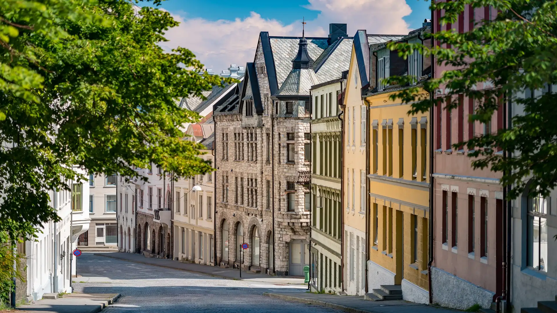 street-lined-with-buildings-alesund-norway-europe-shutterstock-1920