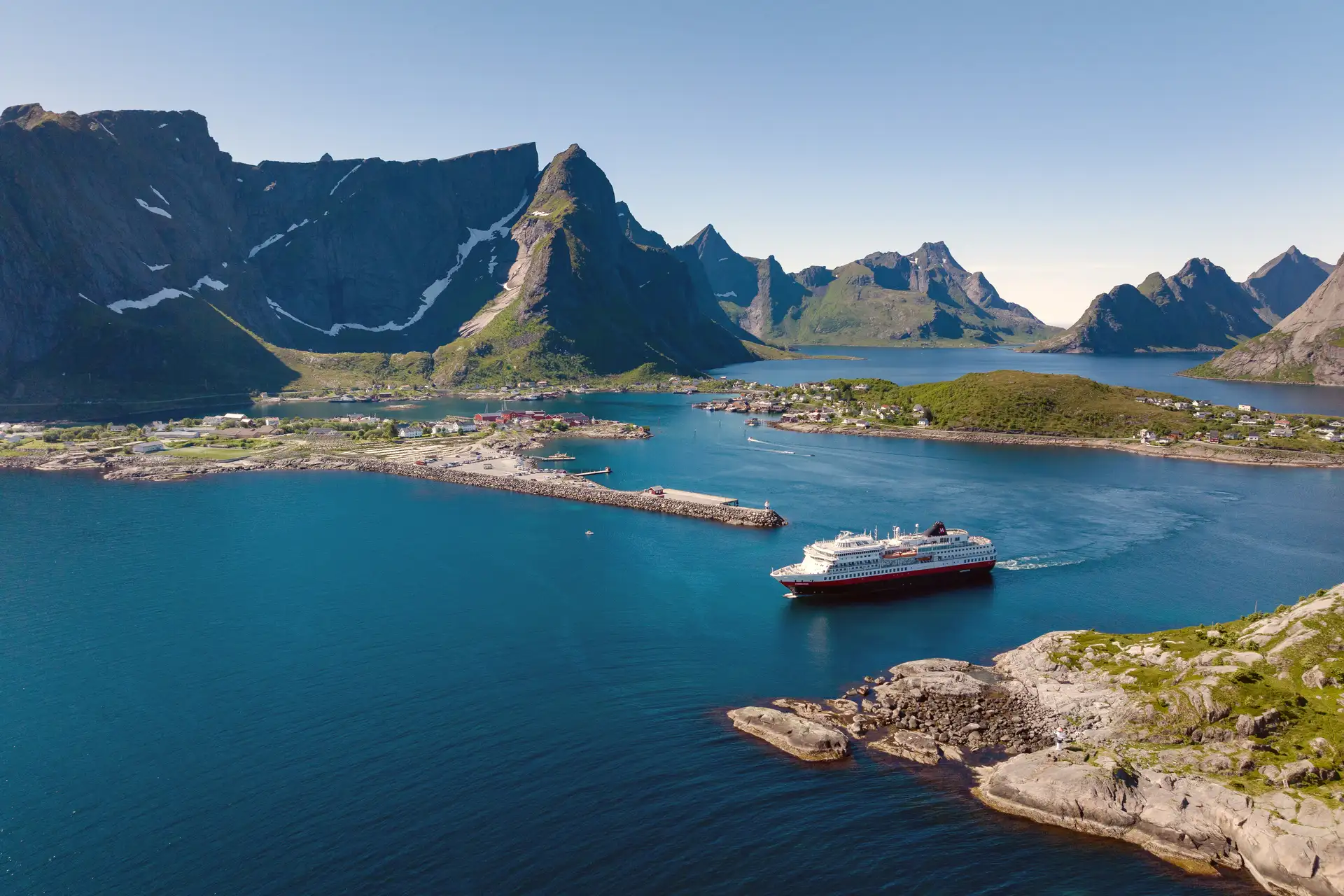 MS Finnmarken sailing in Reine in the Lofoten Islands