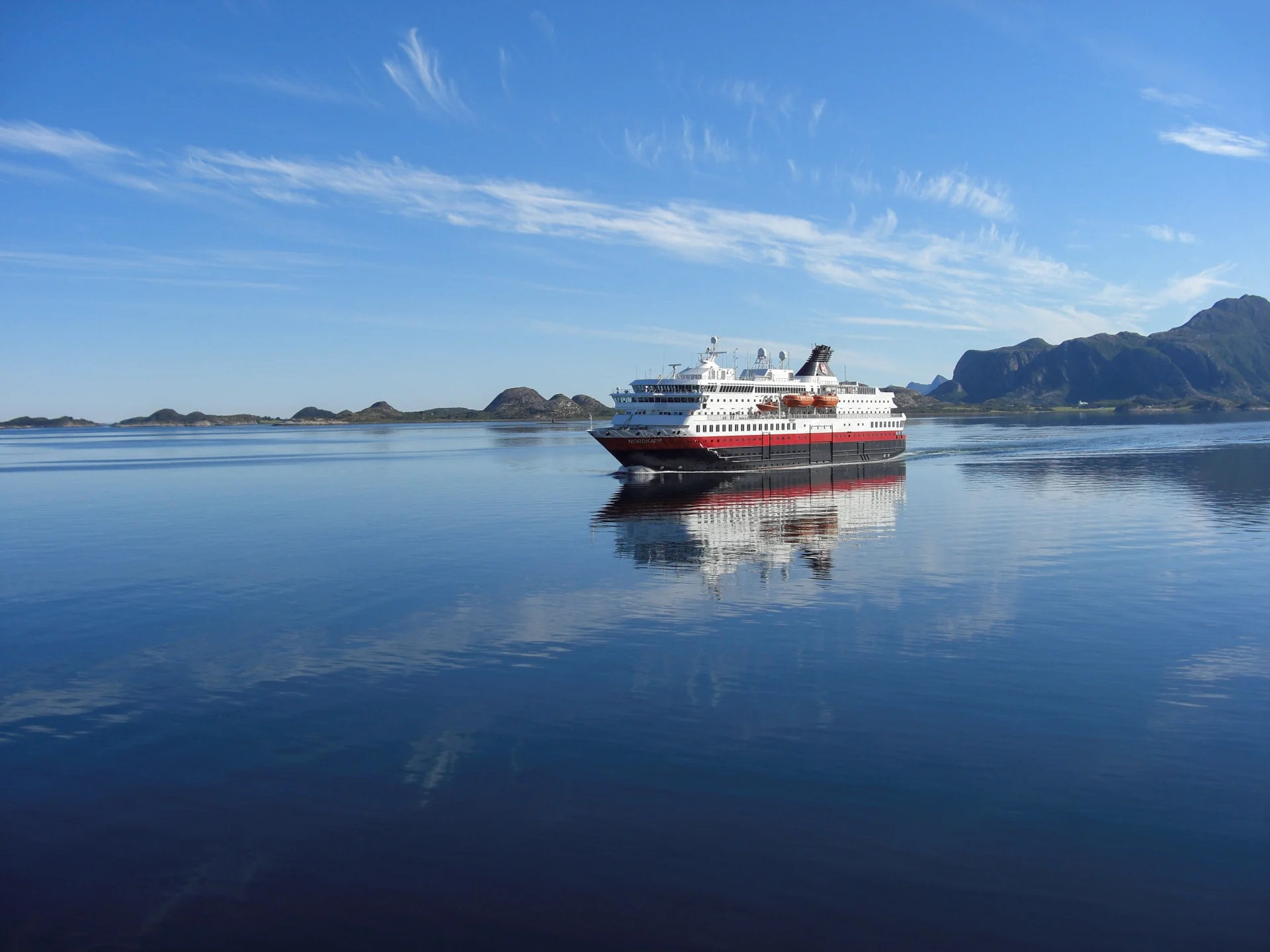 MS Nordkapp sailing on a summer’s day along the Norwegian coast 