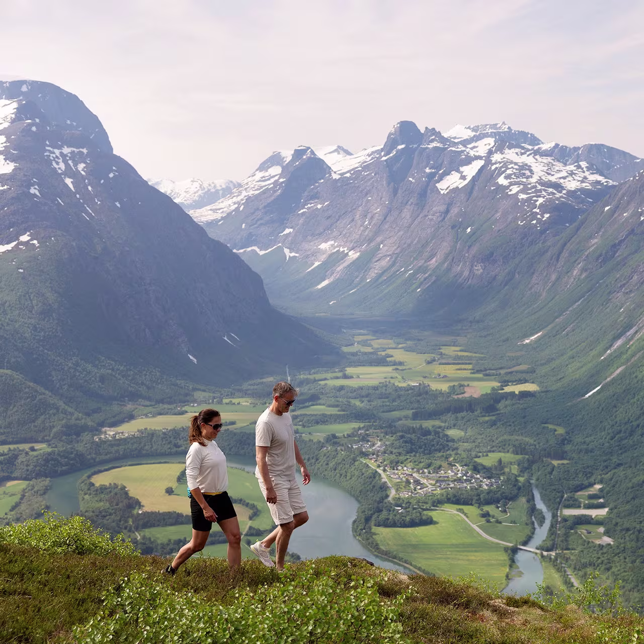 A couple hiking in the mountains above Åndalsnes, Norway. Photo by: Espen Mills