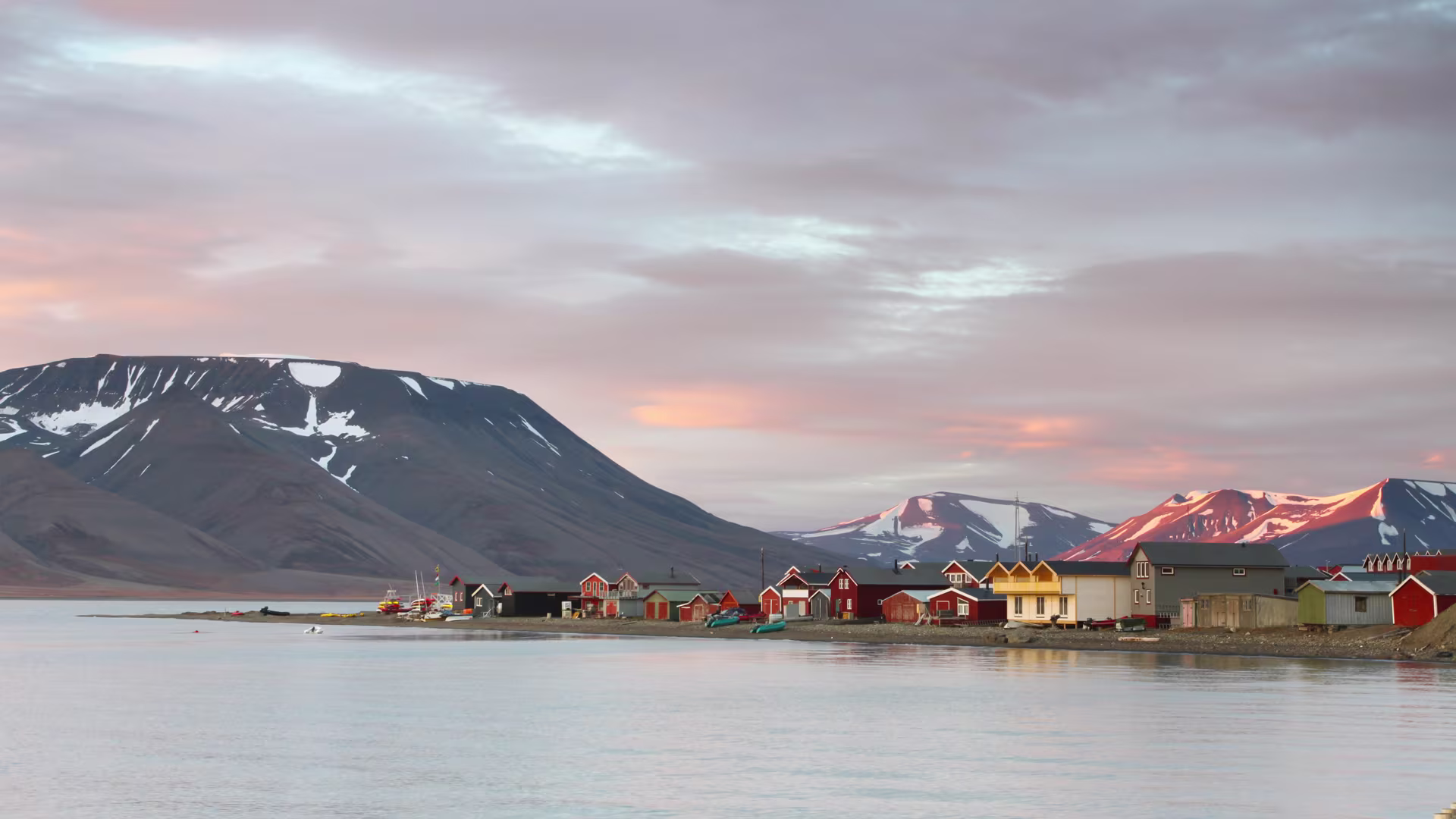 Evening in Longyearbyen, Norway, with villages and mountains in background