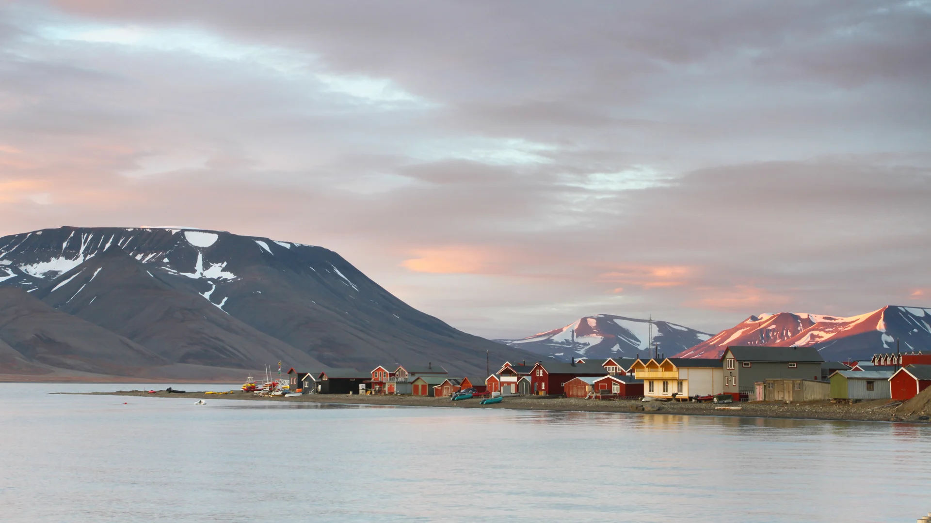 Evening in Longyearbyen, Norway, with villages and mountains in background
