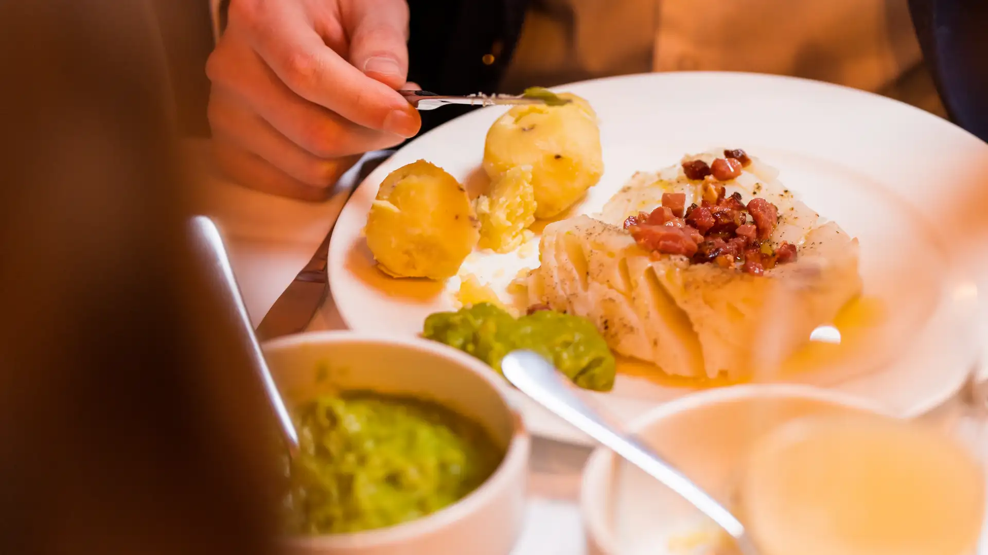 Lutefisk is a traditional Christmas dish in Norway. Image copyright: Fredrik Ahlsen - Visit Norway