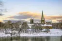 Nidaros Cathedral in winter under a blanket of snow