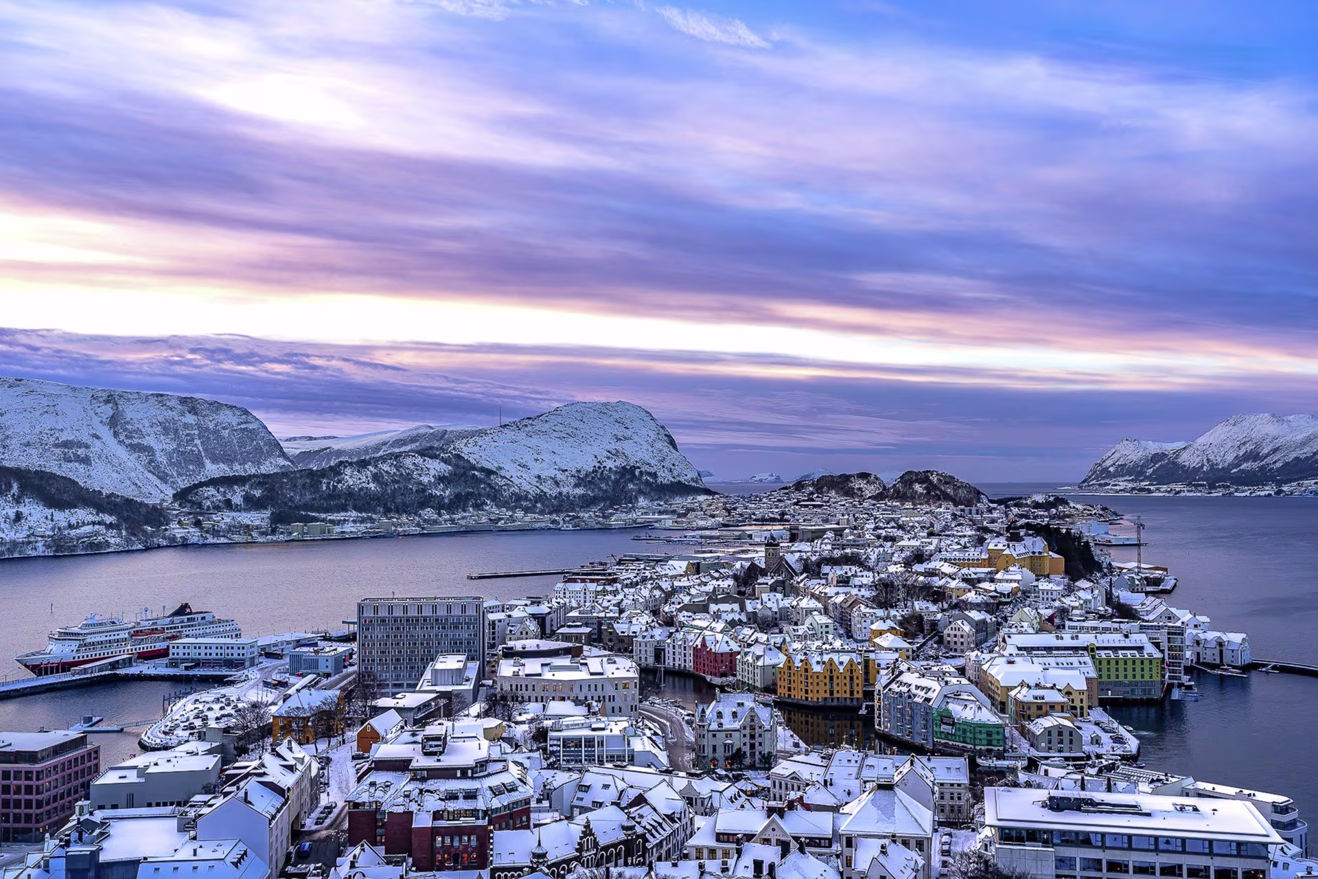 MS Otto Sverdrup anchored against a winter backdrop of Ålesund, Norway