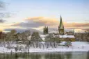 The river Nid in front of the Nidaros Cathedral, Trondheim, Norway on a nice winter day.