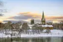 The river Nid in front of the Nidaros Cathedral, Trondheim, Norway on a nice winter day.