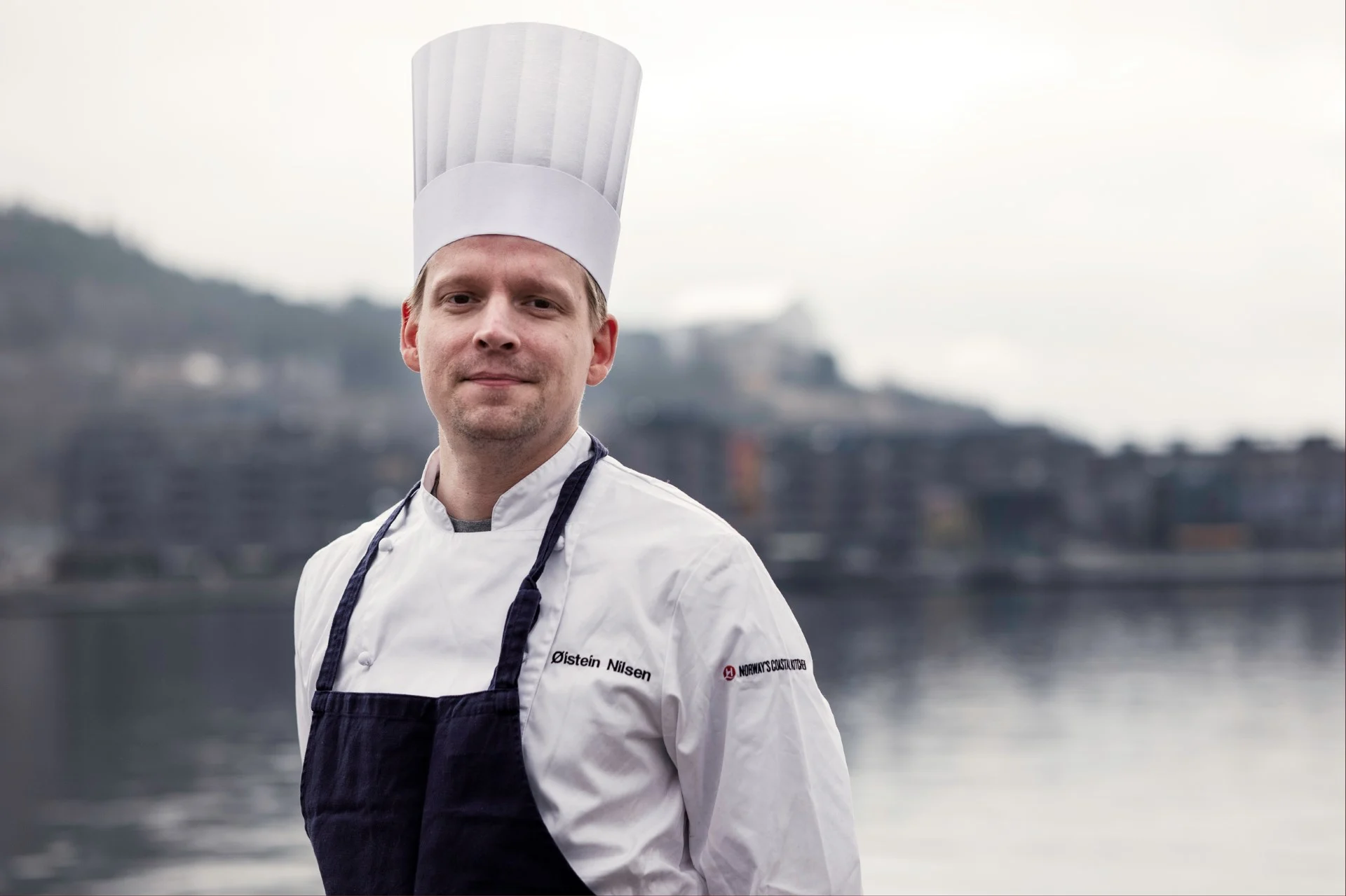 Head chef Øystein Nilsen is standing outside in his chefs clothing