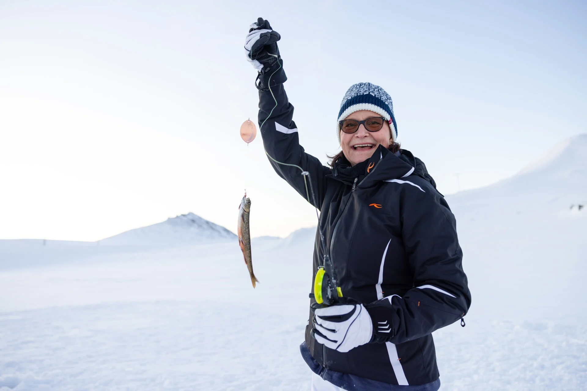 Arctic ice fishing excursion in Honningsvåg, Norway.