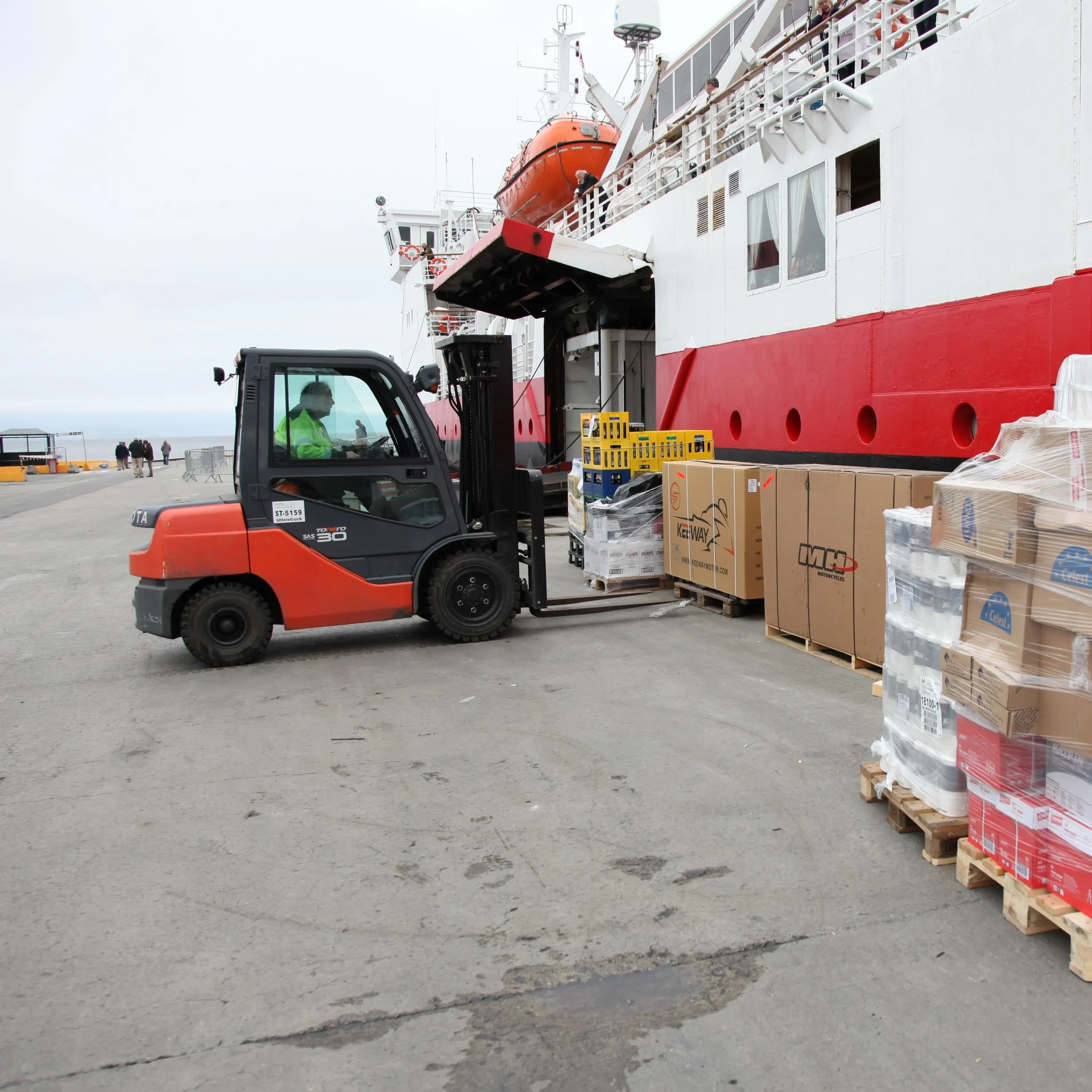 Truck adding cargo to a Hurtigruten ship
