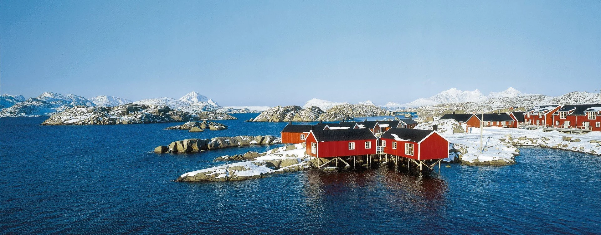 Traditional red fishing cottages, called "Rorbu", in the town of Svolvær, Norway