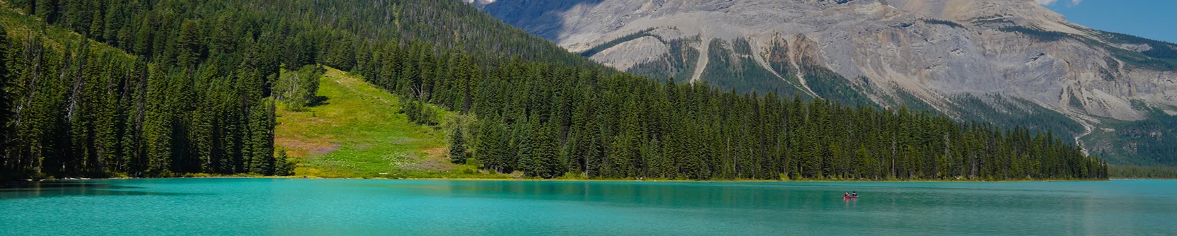 Lake Louise with two people canoeing 