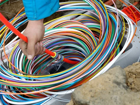 A bundle of multi-colored electrical cords