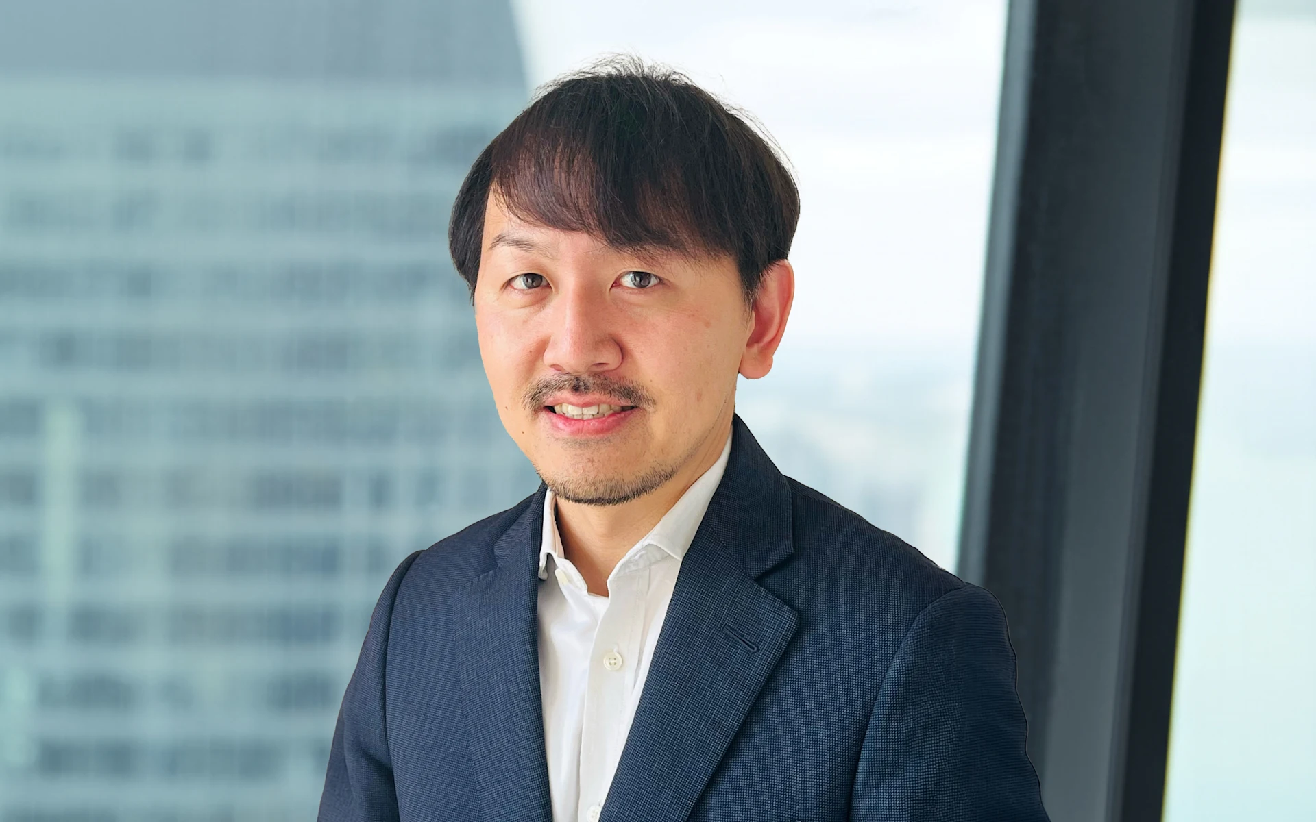 Tokushi Kojima headshot