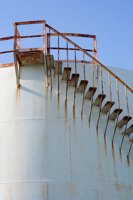 Photograph of rusting staircase.