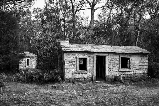 Photograph of old abandoned stone cottage at the historic Heatherlie Quarry site.  The quarry operated during the late 19th and early 20th centuries.