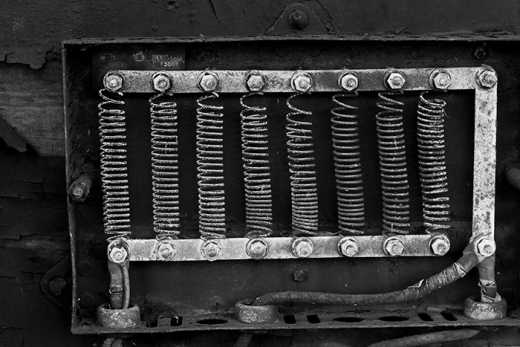 Photograph of springs in a box.