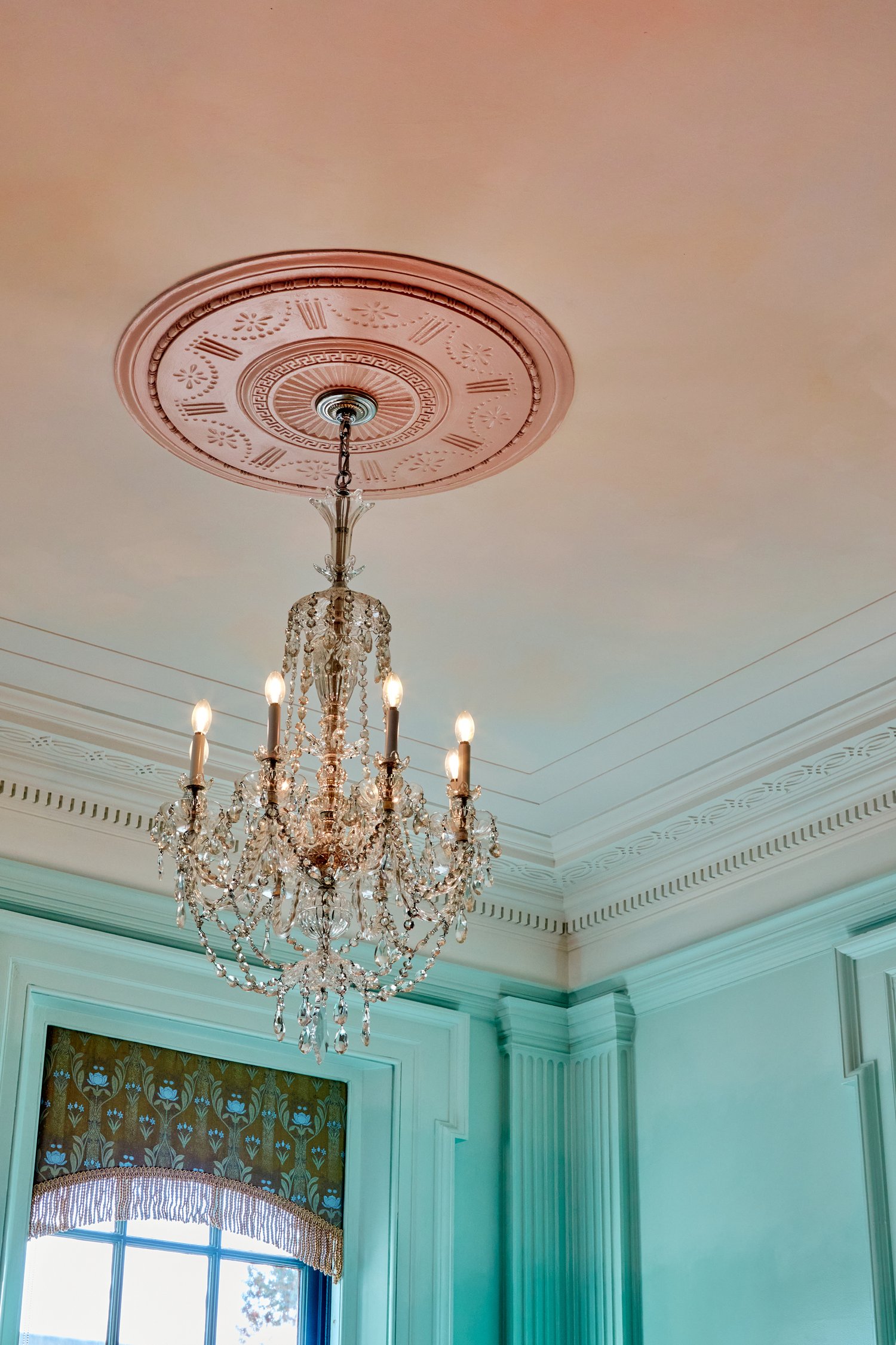 Three-color lime wash finish on ceiling. Gradient paint finish on the walls.