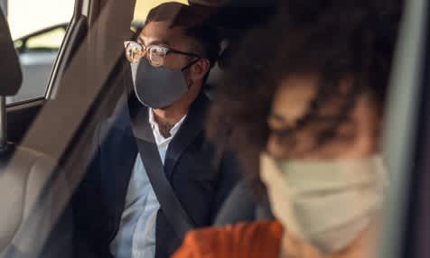 masked passenger rider in glasses