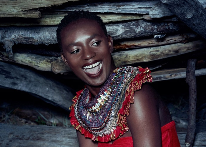 Designer, Anita Quansah created a dramic collar using your paper beads, glass beads, safety pins, cloth and other materials. This collar was auctioned to provide even more funds to charity:water's efforts in Tanzania. 