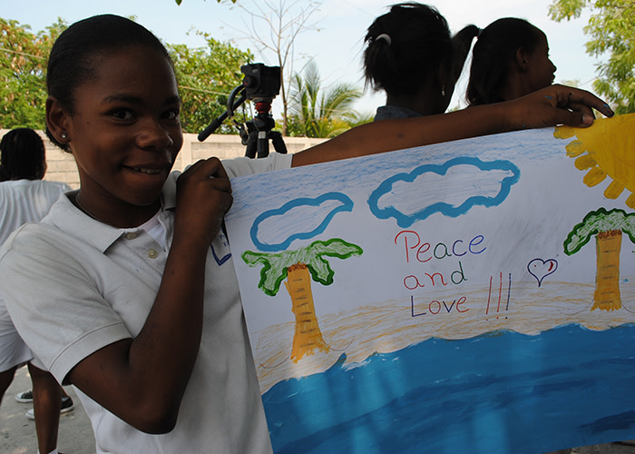Peace and Love from a Haiti student.