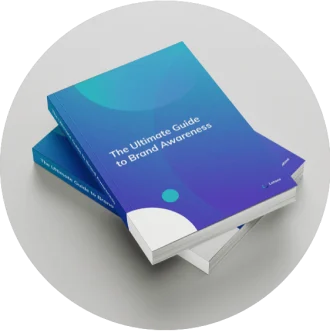 Round framed blue book with title of The Ultimate Guide to Brand Awareness