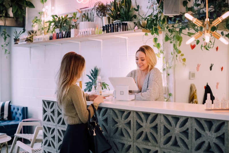 Two women standing at a counter [Article Image]