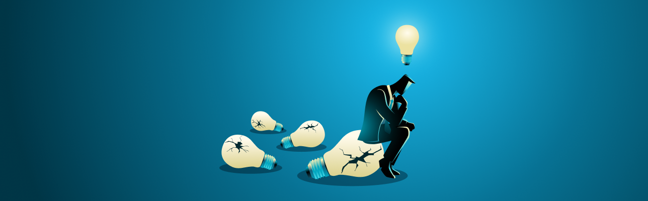 Illustration of man sitting on a broken lightbulb [Cover Image]