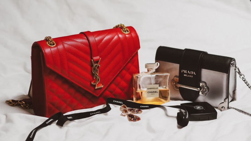 Image of luxury purses and perfume [Article Image]