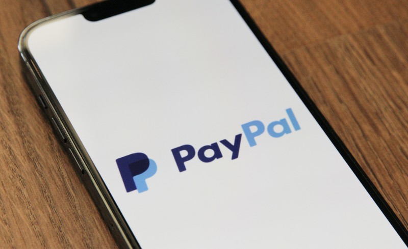 Image of PayPal logo on phone [Article Image]